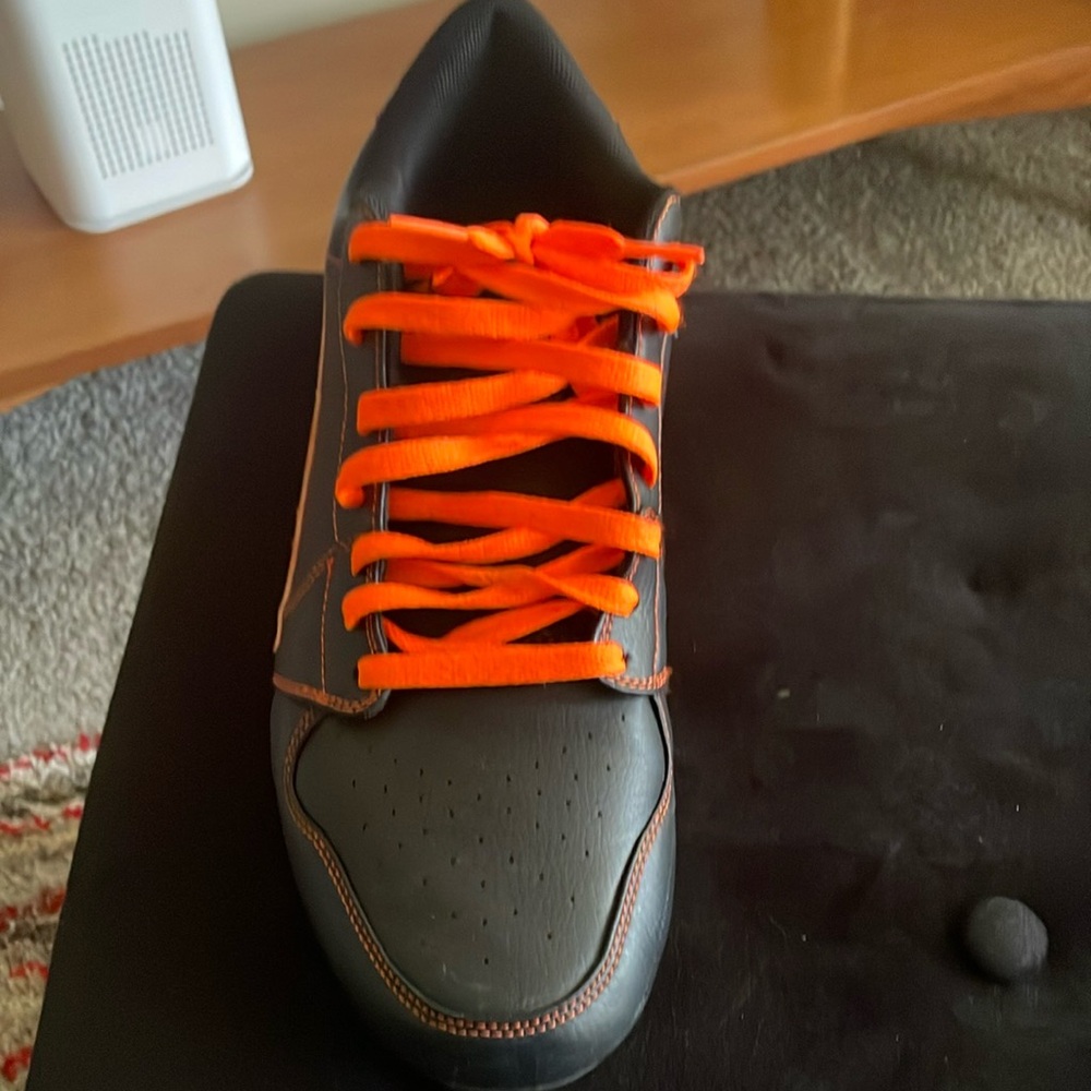 Black and Orange Athletic Shoes with Vibrant Laces